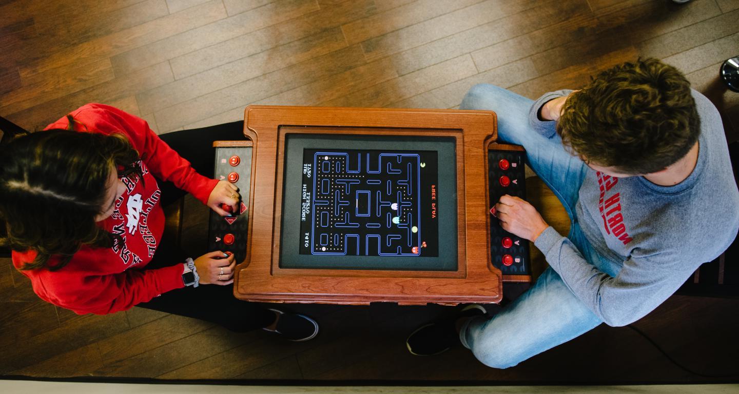 students playing game in lounge